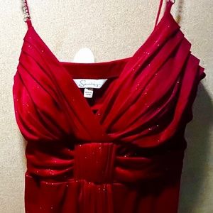 Sparkly dark red formal fitting and flowing dress made by “ Speechless”